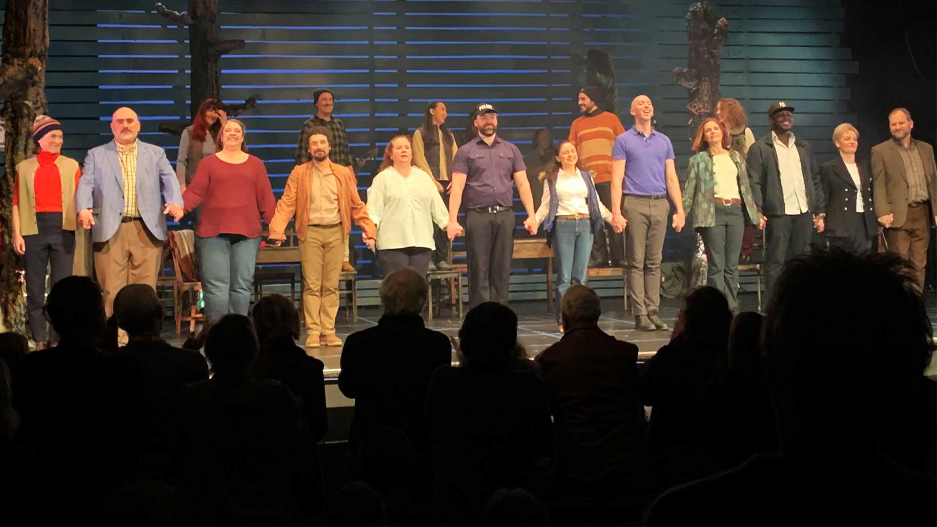 the cast and musicians of Come From Away by Therry Theatre take a curtain call at The Arts Theatre.